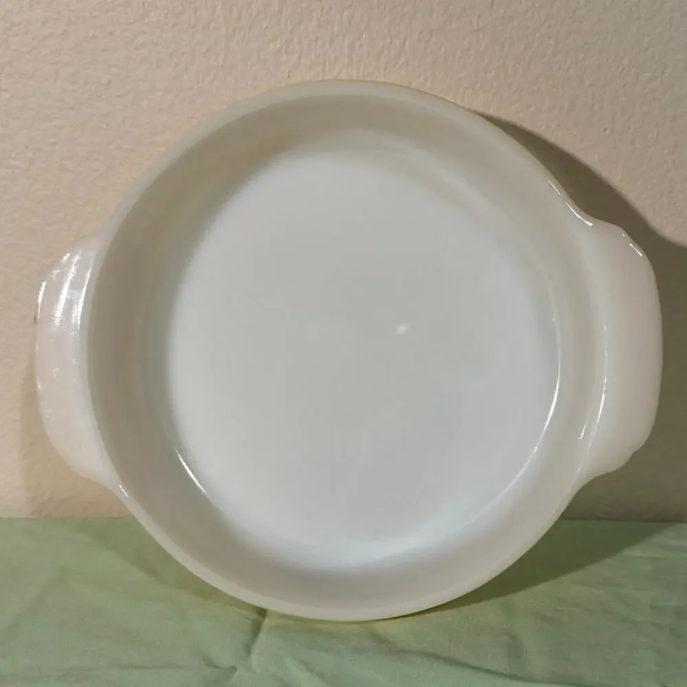 Fire King 8” Peach Luster casserole baking dish. Vintage mid-century